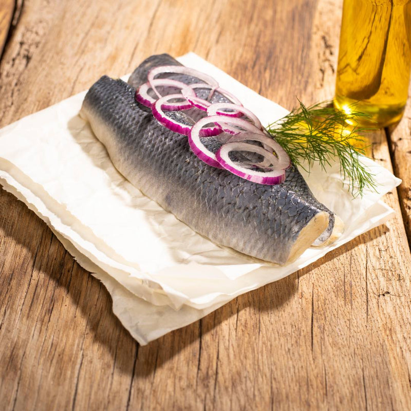 Saftiger Bismarckhering in würziger Marinade erhältich bei der Räucherei Hoffmann